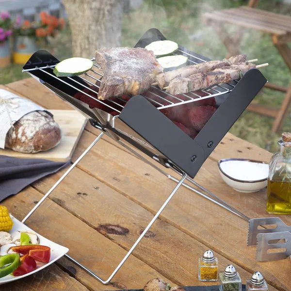Taitettava ja kannettava minihiiligrilli Foldecue InnovaGoods