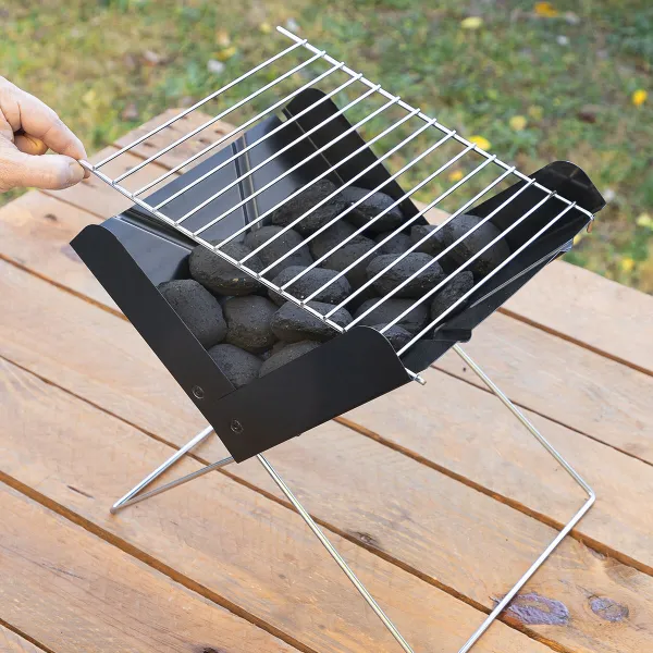 Taitettava ja kannettava minihiiligrilli Foldecue InnovaGoods