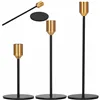 Metal candlesticks on high legs Springos HA7470