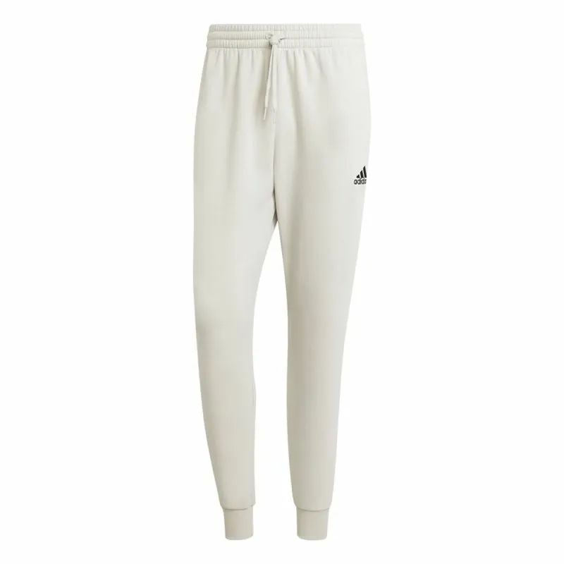 Pitkät urheiluhousut Adidas Essentials Fleece Regular Tapered Valkoinen